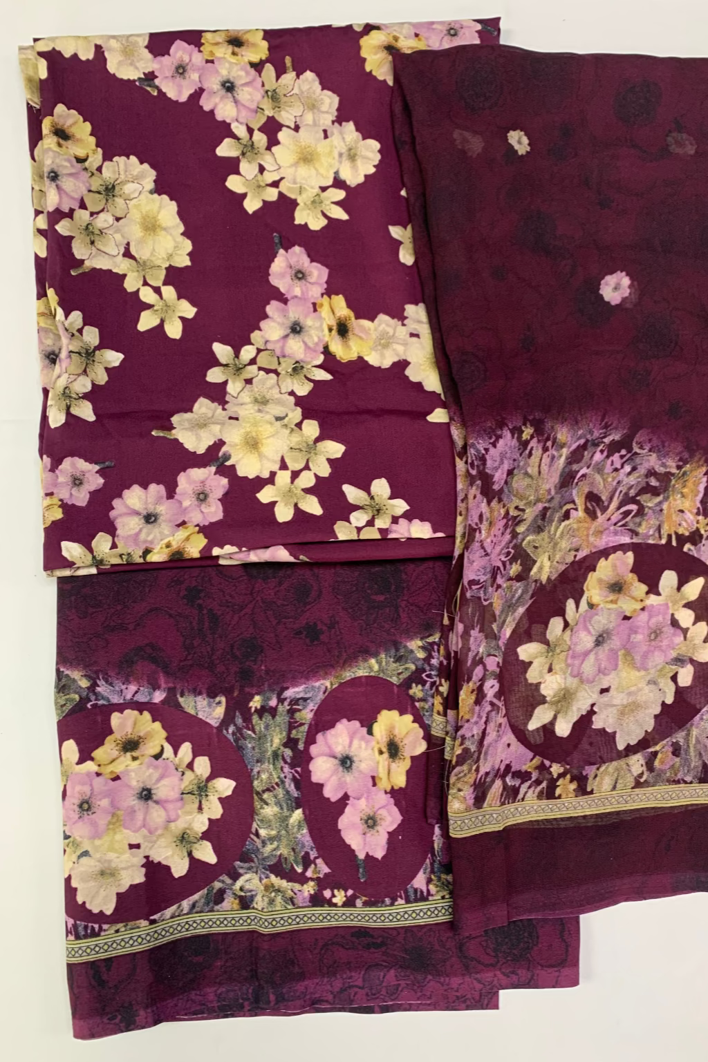 Purple floral fabric with a white background