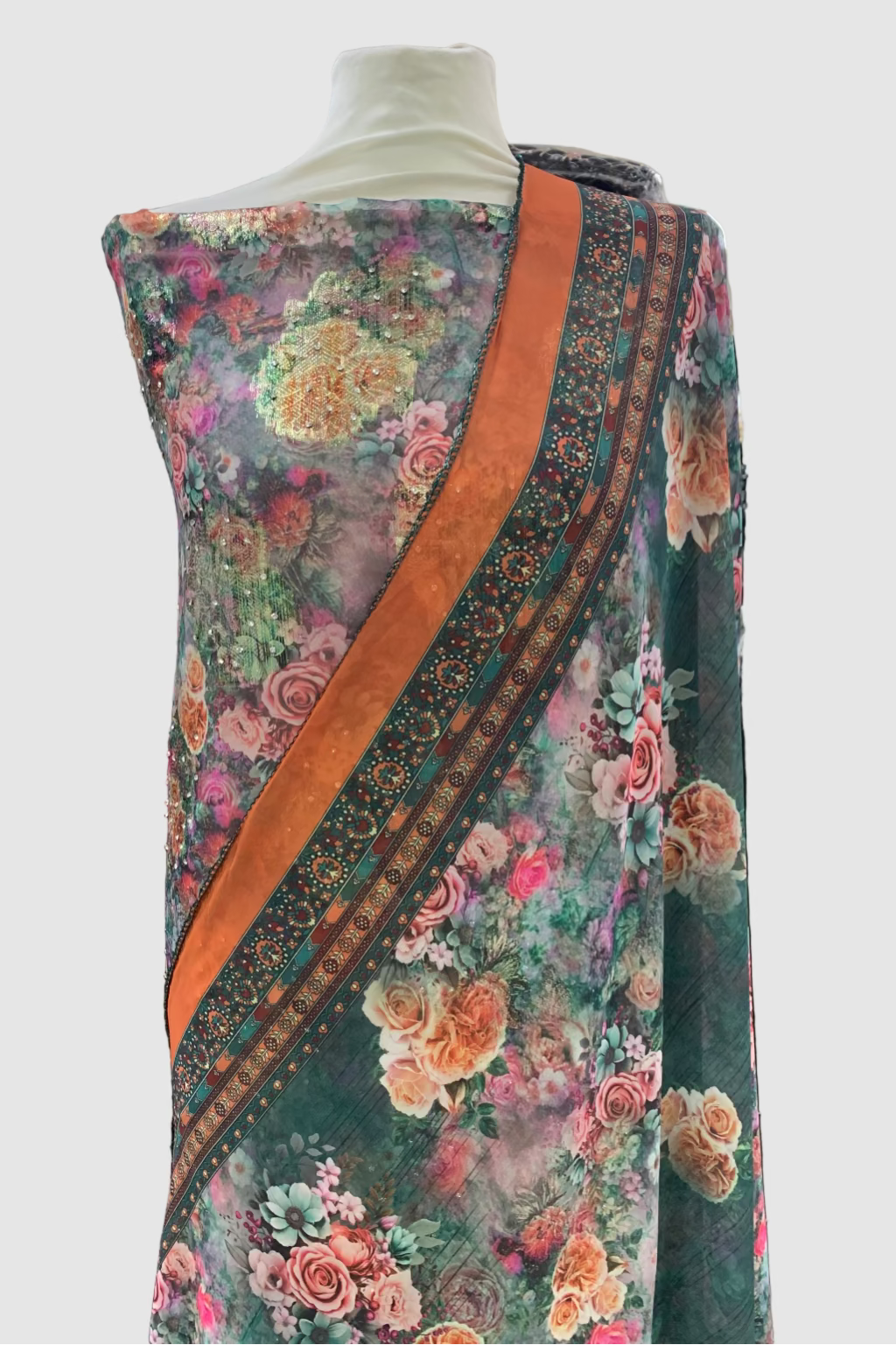 Floral patterned fabric on a mannequin in a store setting