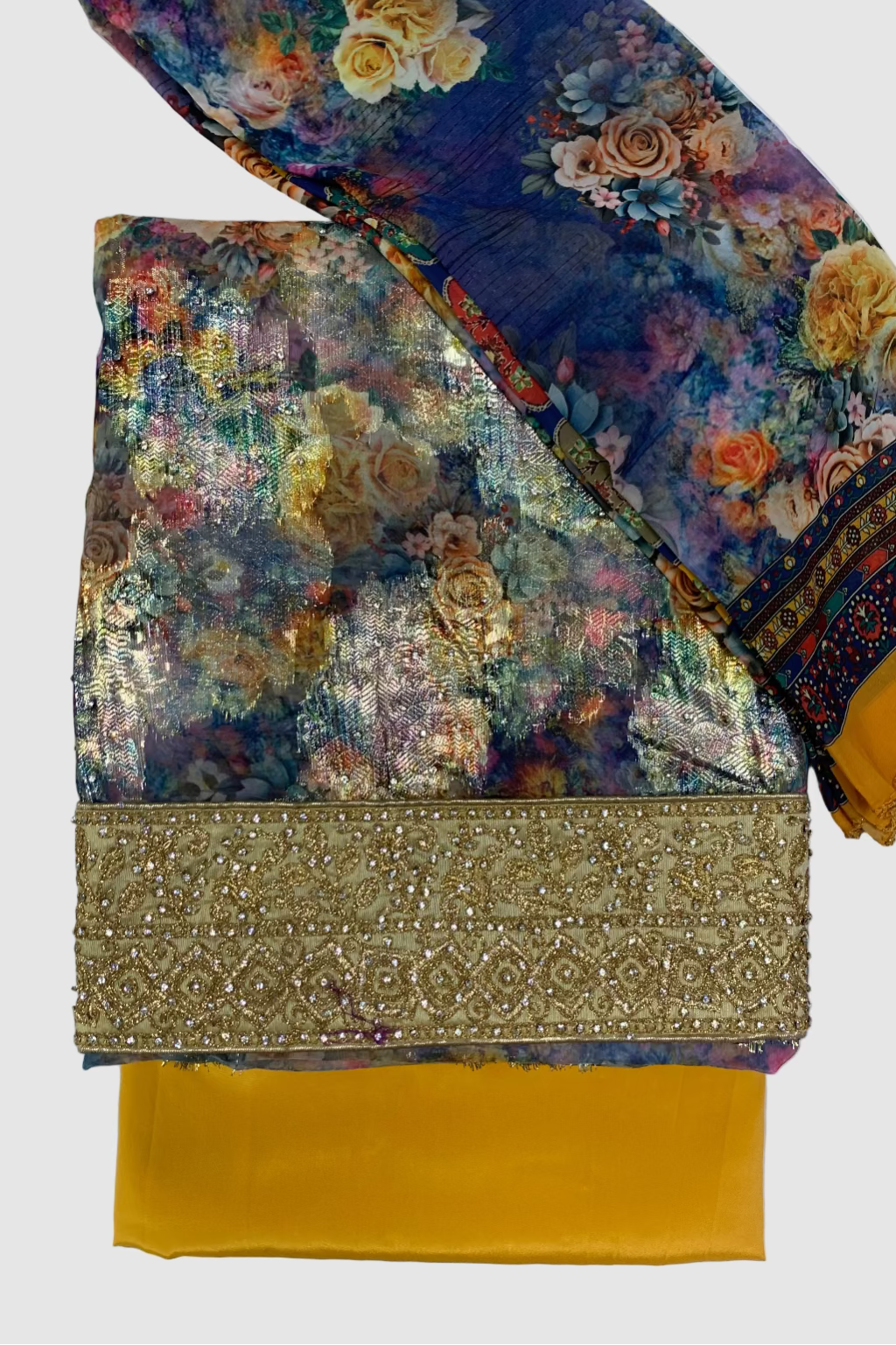 Colorful floral fabric with a gold embroidered border on a white background