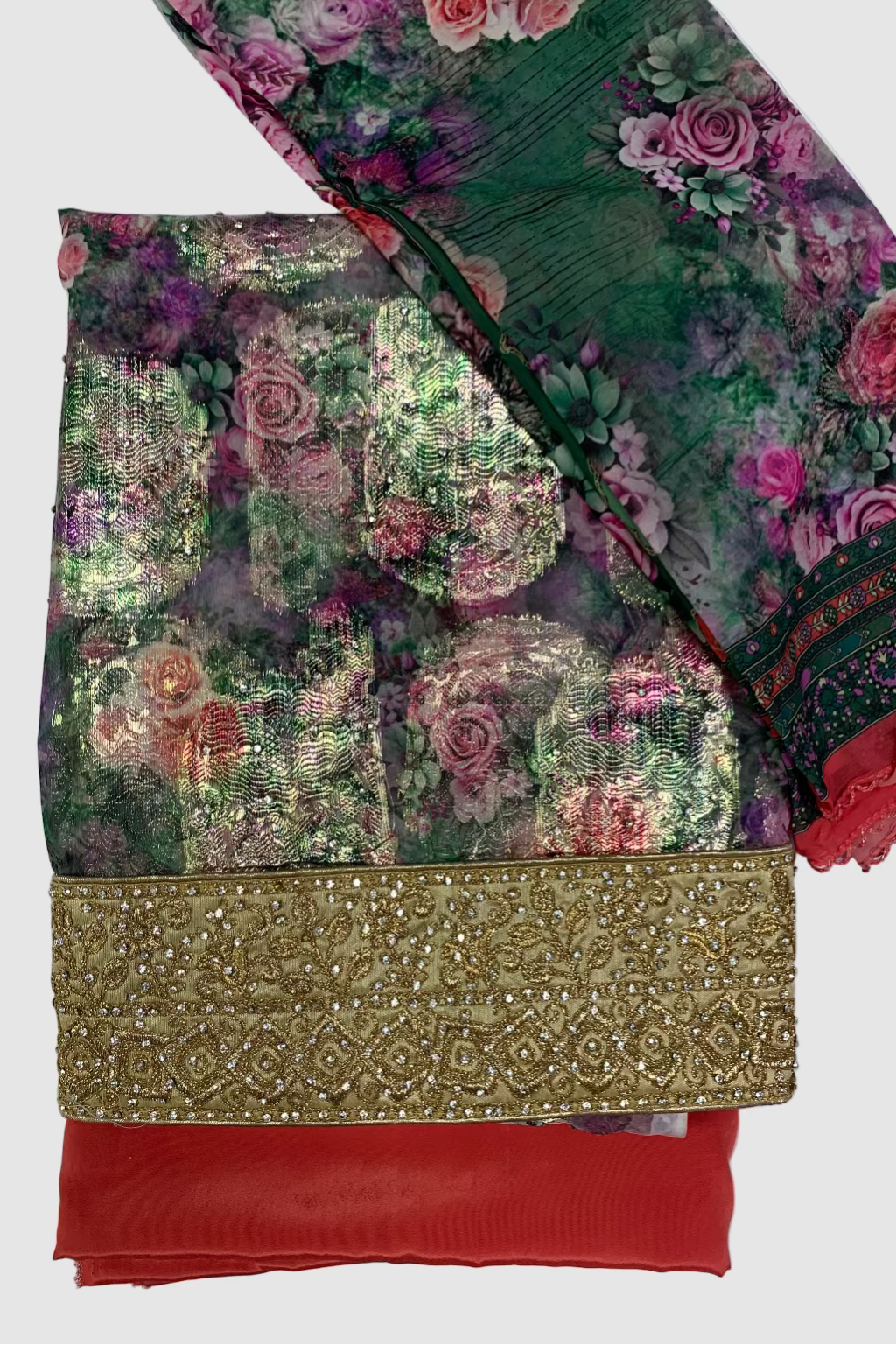 Colorful fabric with floral patterns and gold embroidery on a white background