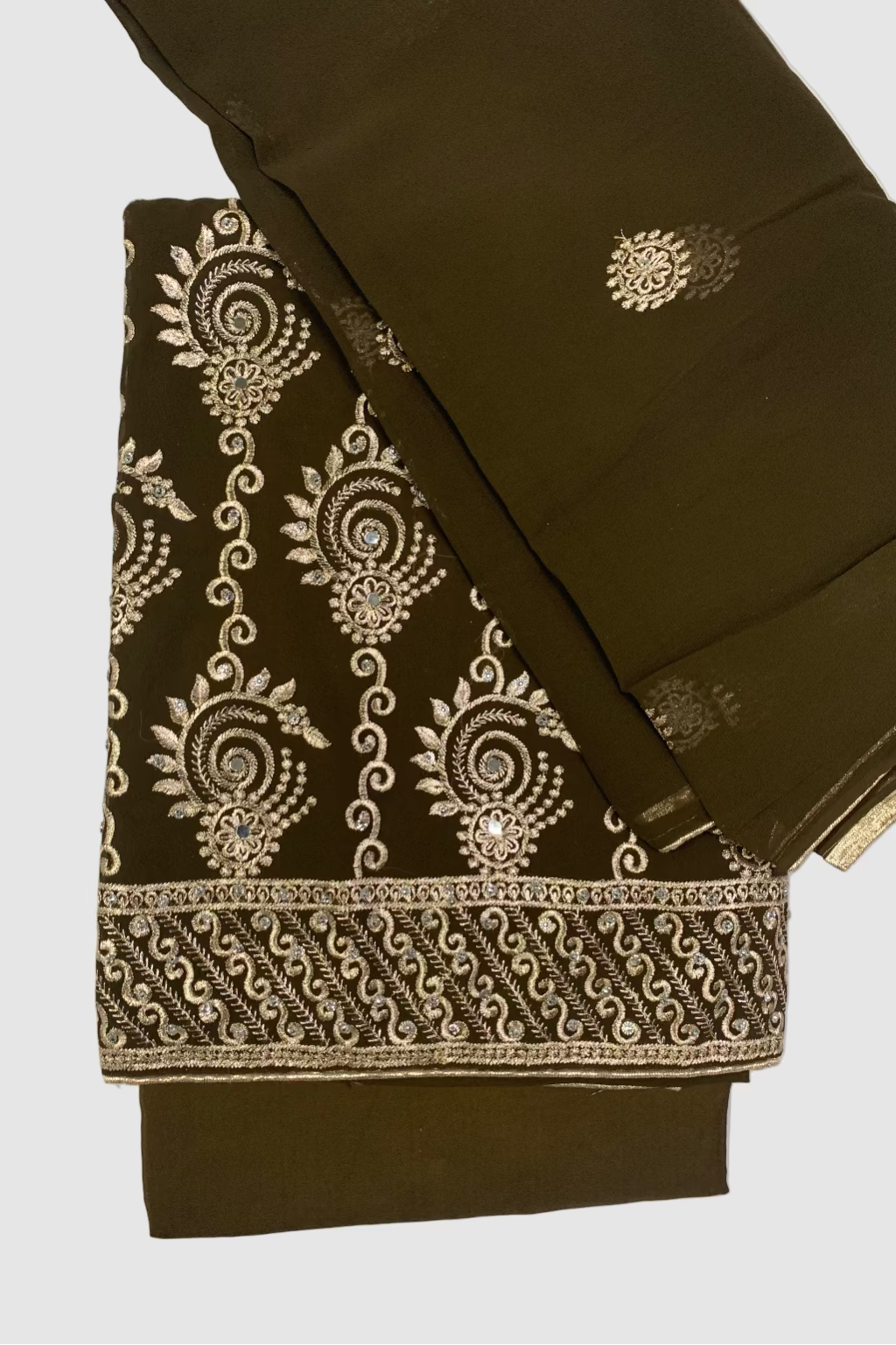 Brown fabric with intricate gold embroidery patterns on a white background