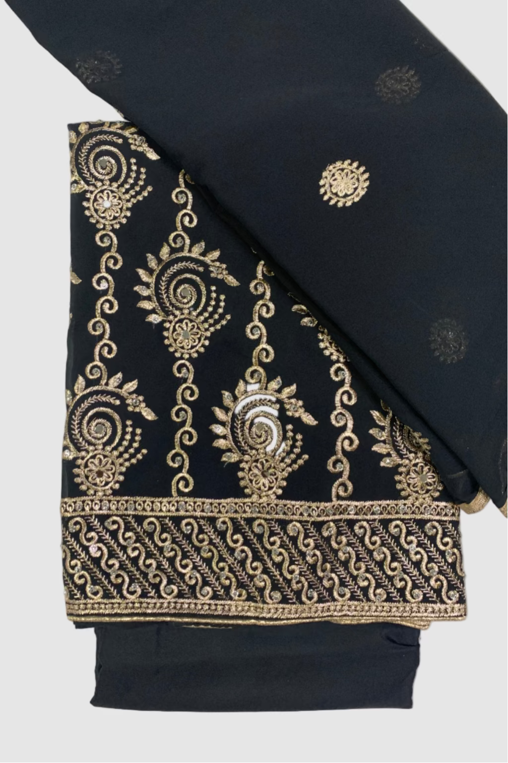 Black fabric with gold embroidery on a white background