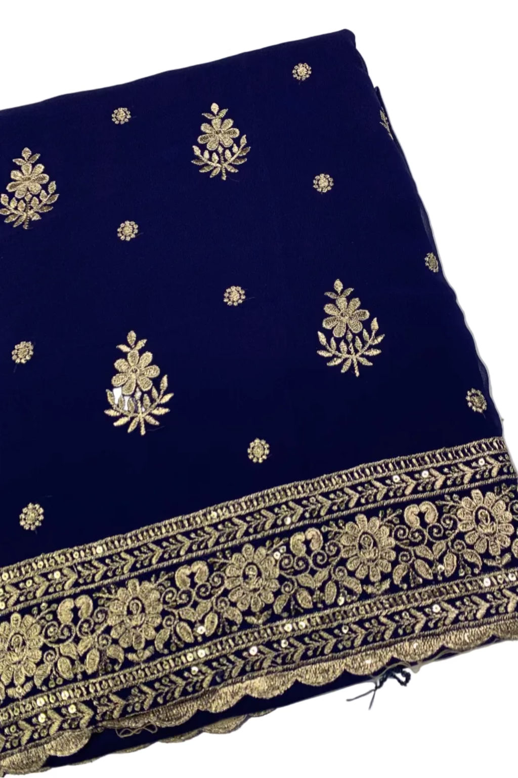 Blue fabric with gold embroidery on a white background