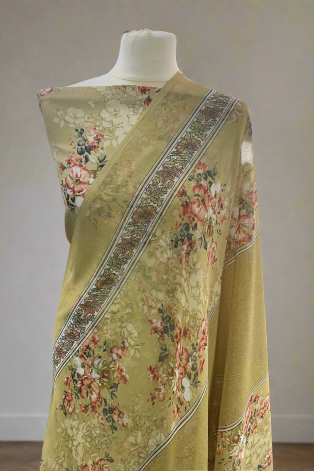 Floral patterned fabric draped over a mannequin in a store setting
