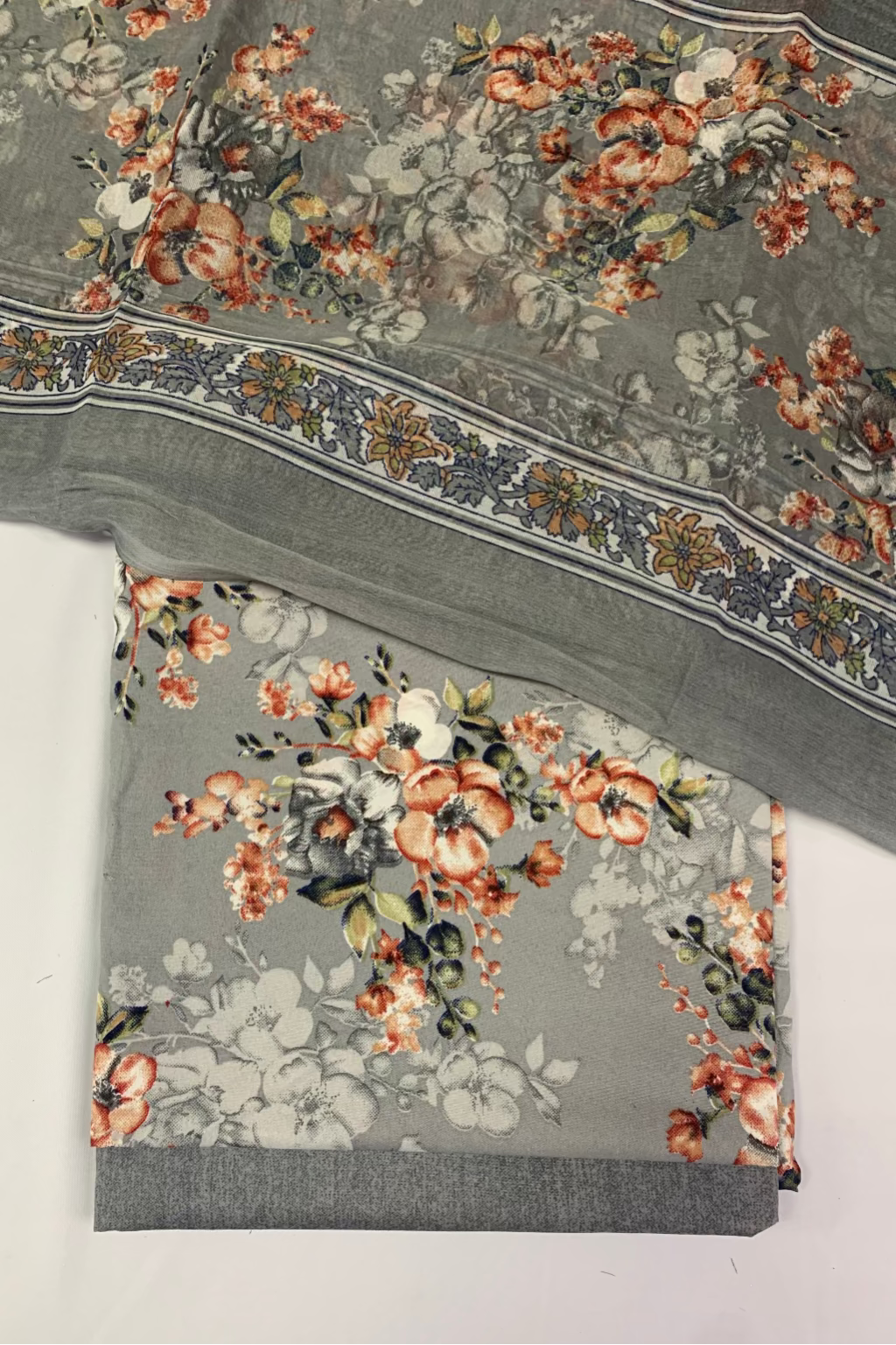 Floral patterned fabric with a gray background