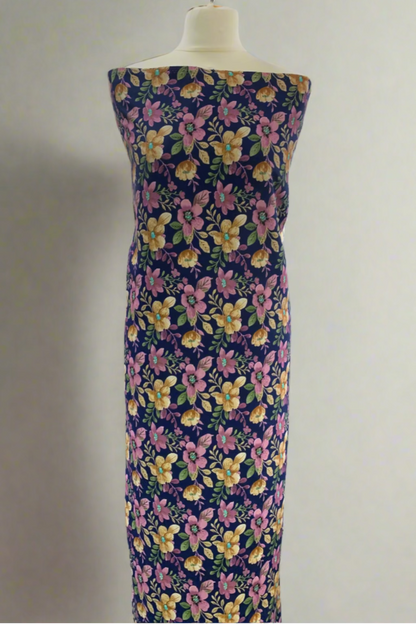 Floral dress on a mannequin in a store setting