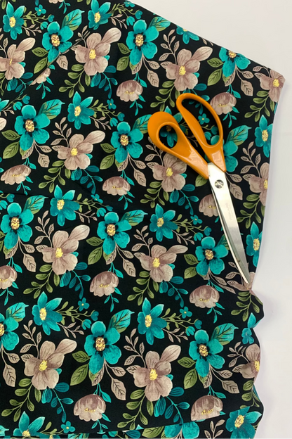 Floral fabric with scissors on a white background