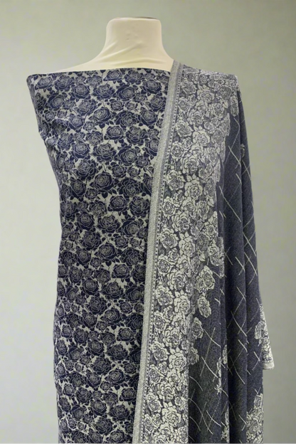 Mannequin wearing a blue and white floral fabric in a store setting