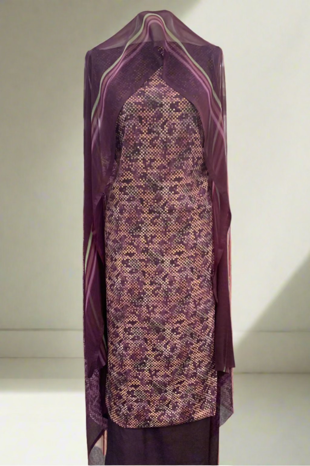 Purple patterned garment in a fabric store setting