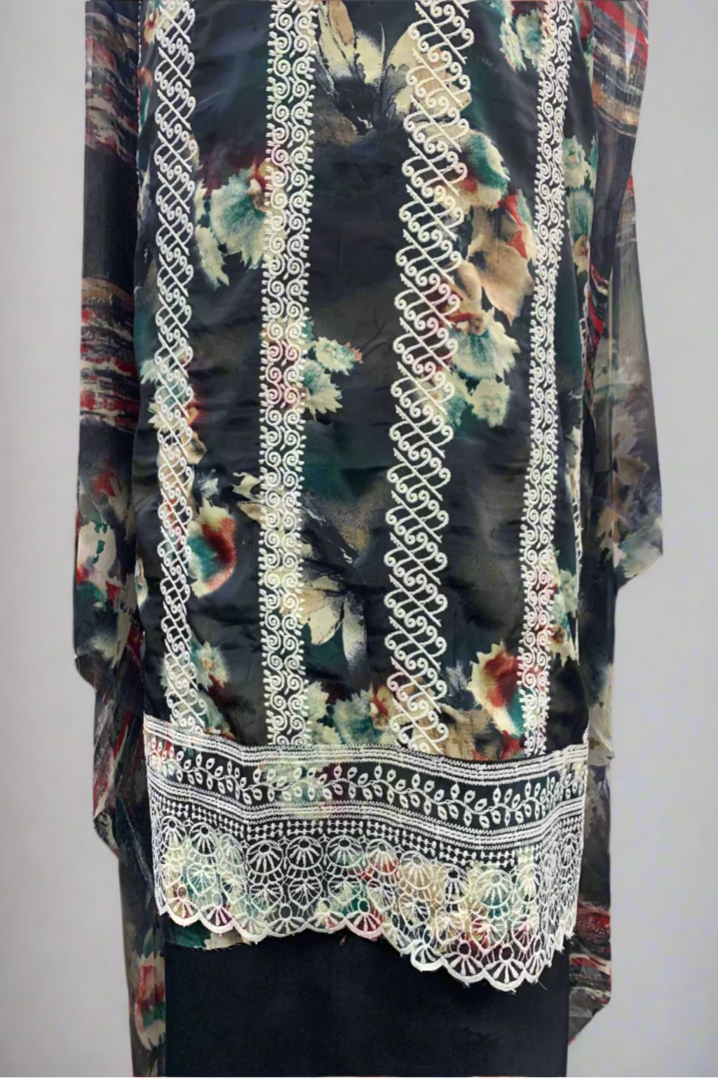 Floral fabric with embroidery trim displayed in a store setting