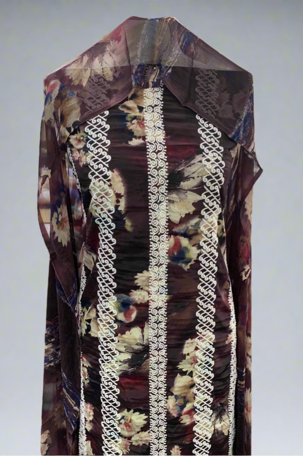 Floral-patterned garment with embroidery detail in a store setting