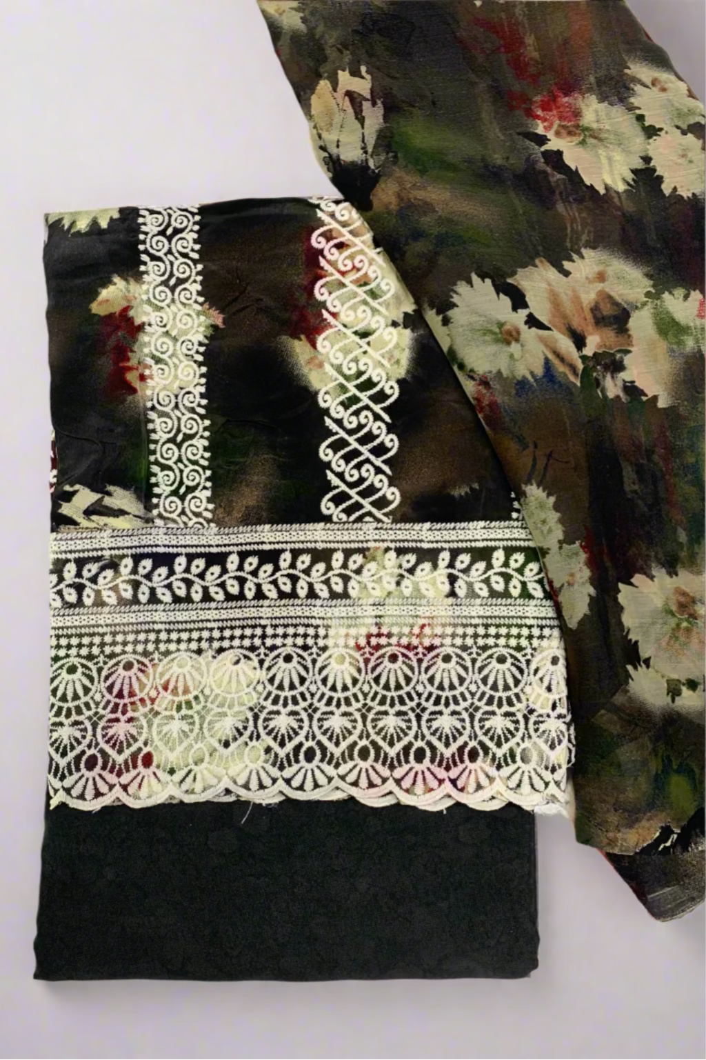 Floral fabric with intricate lace detailing on a white background