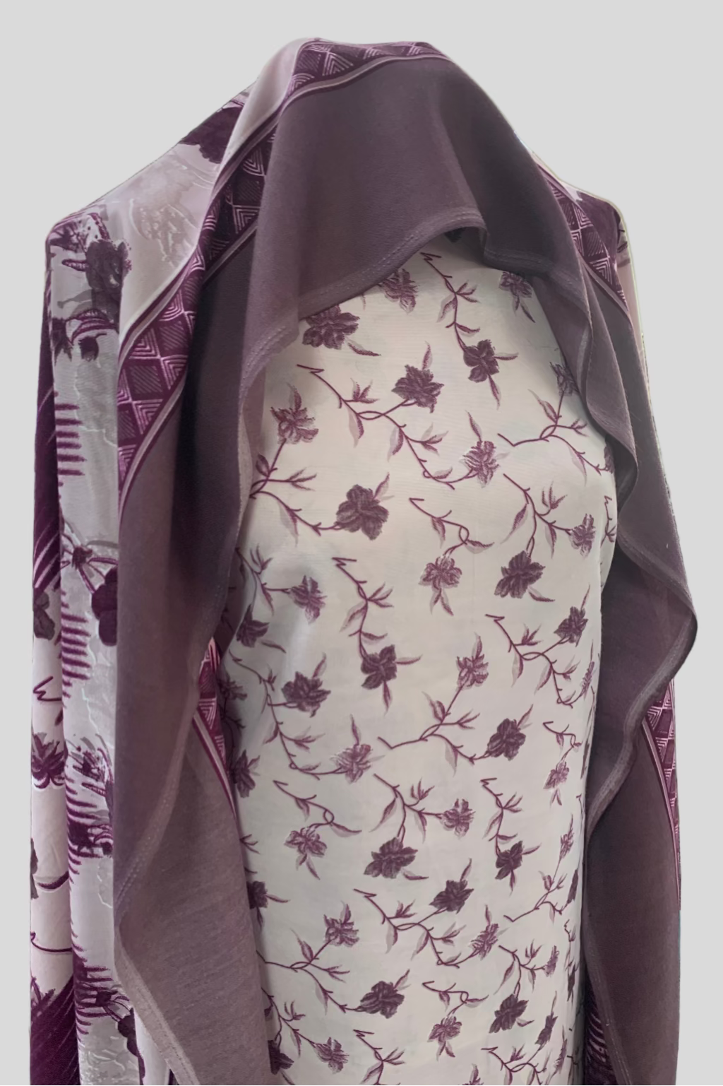 Fabric with floral pattern on a mannequin in a fabric store
