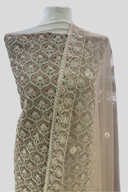 Embroidered fabric on a mannequin in a store setting
