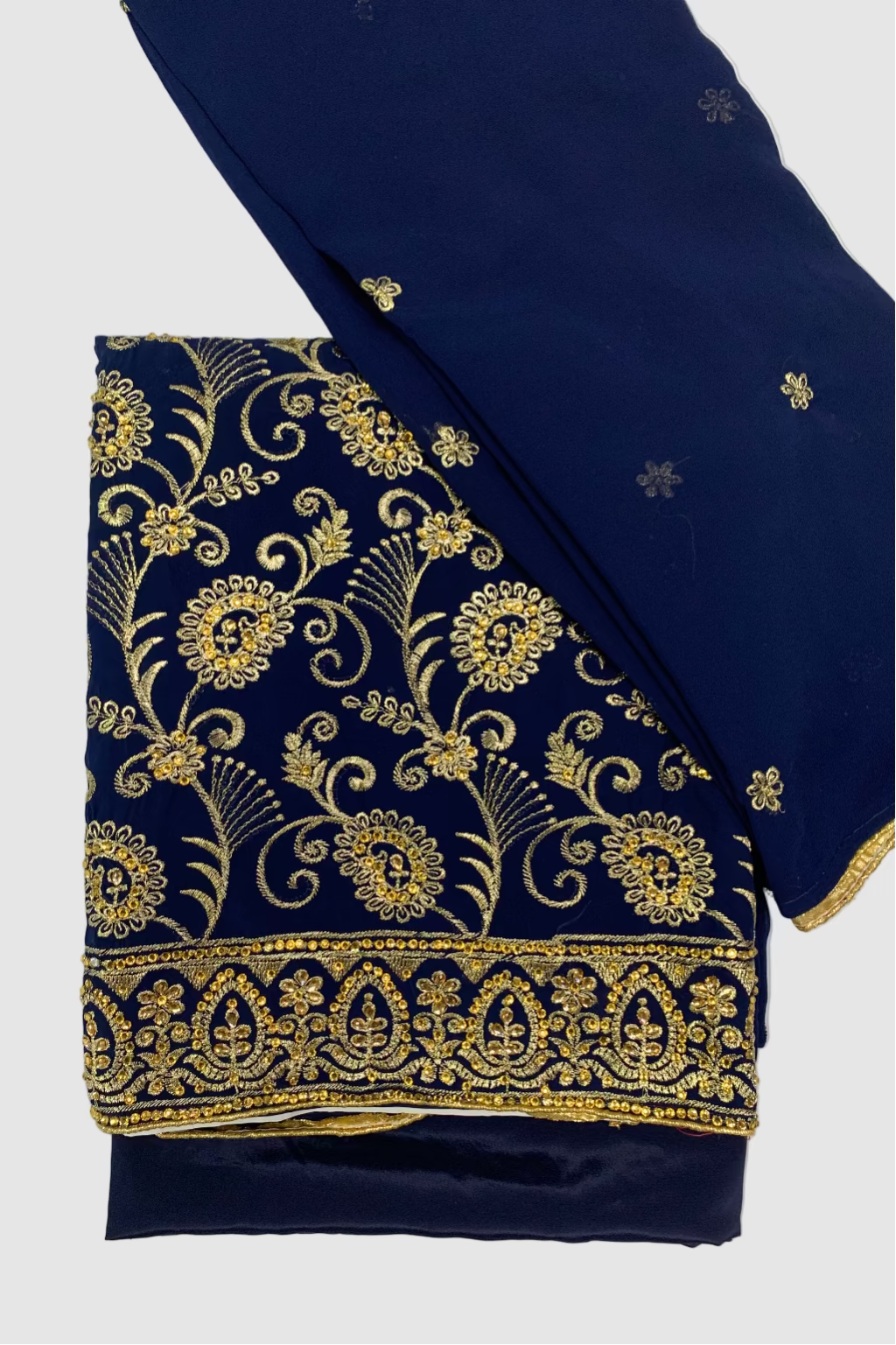 Navy blue fabric with gold embroidery on a white background