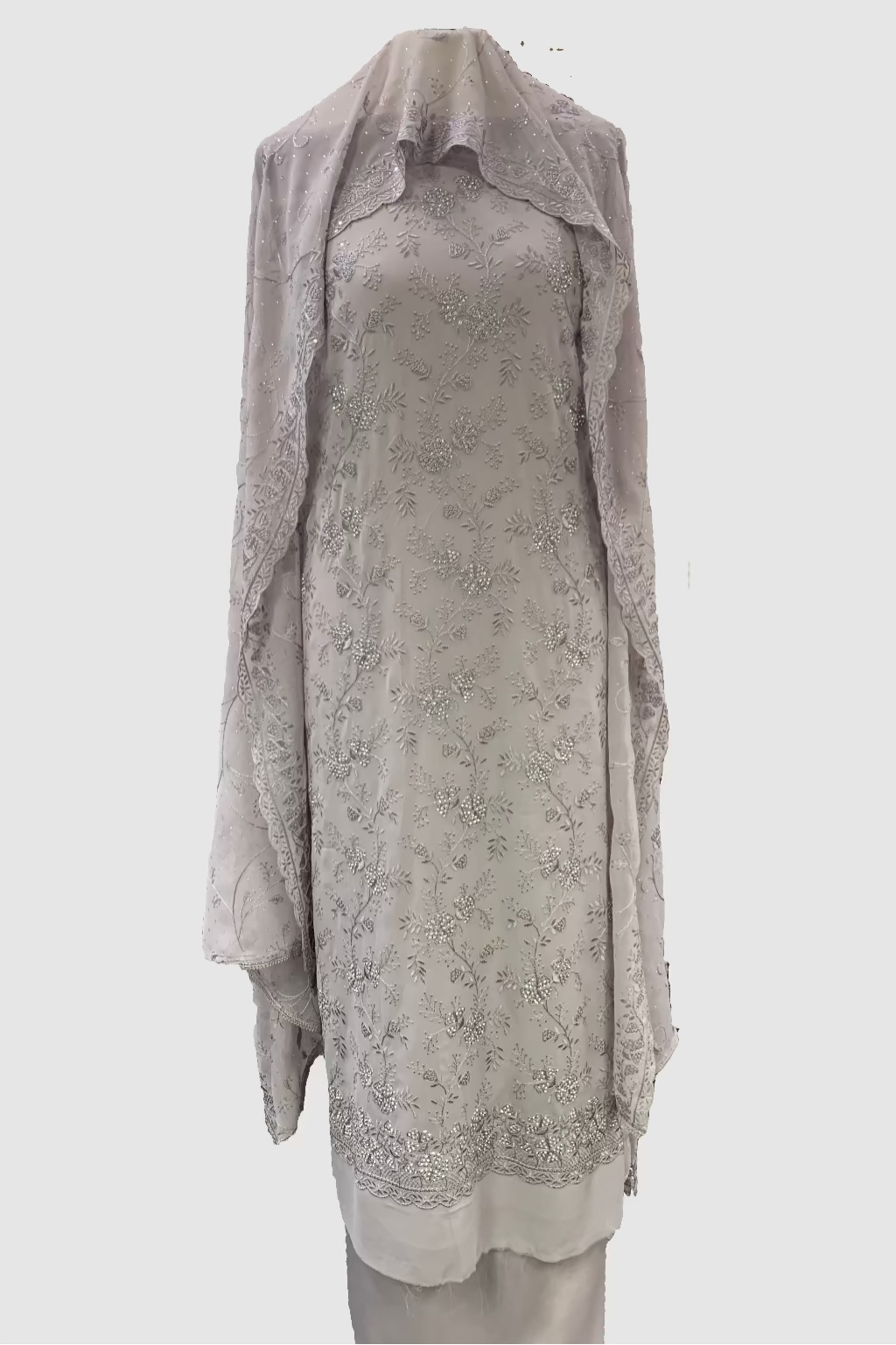 Light purple floral dress on a mannequin in a store setting