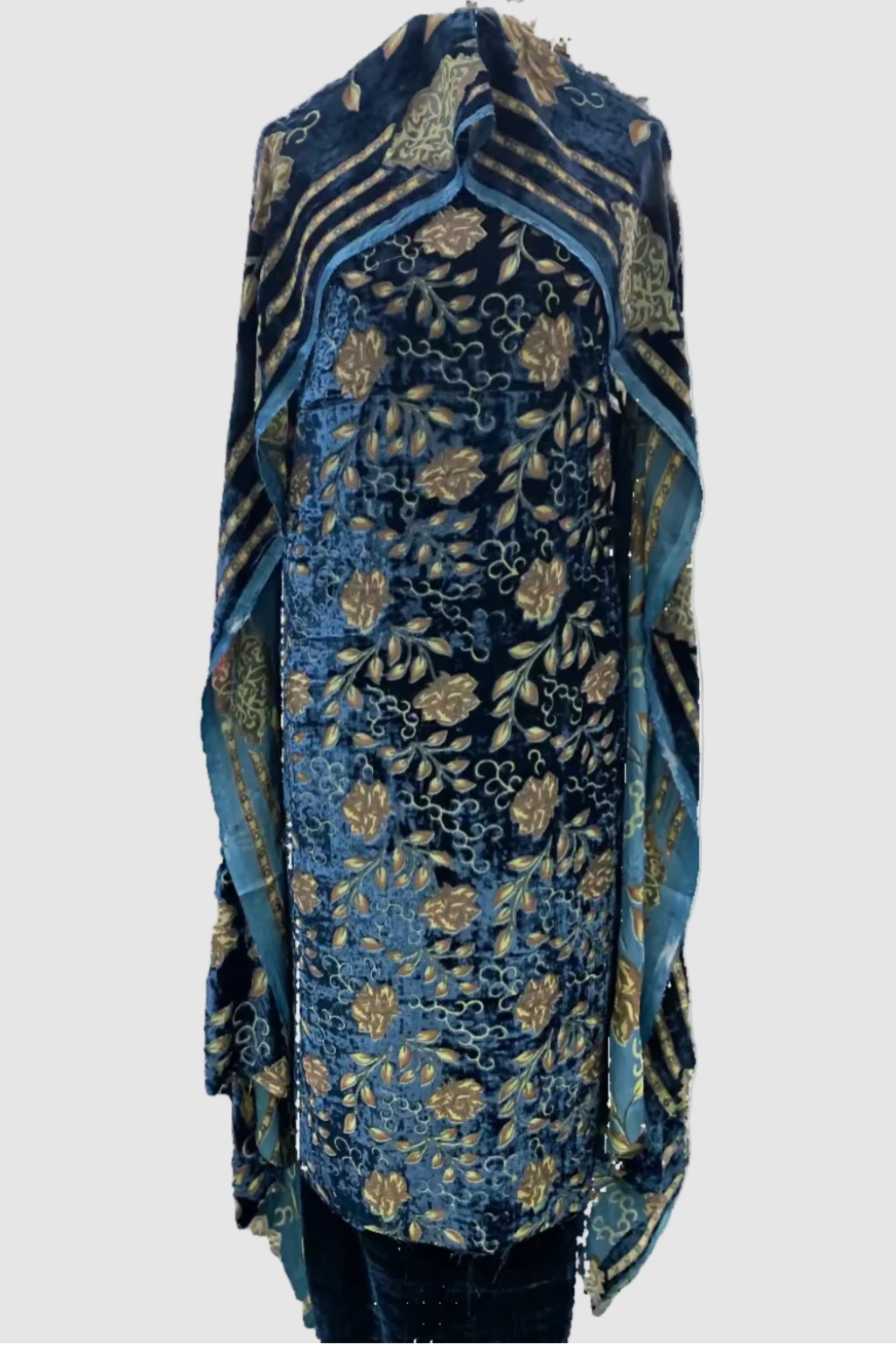 Blue printed garment in a store setting