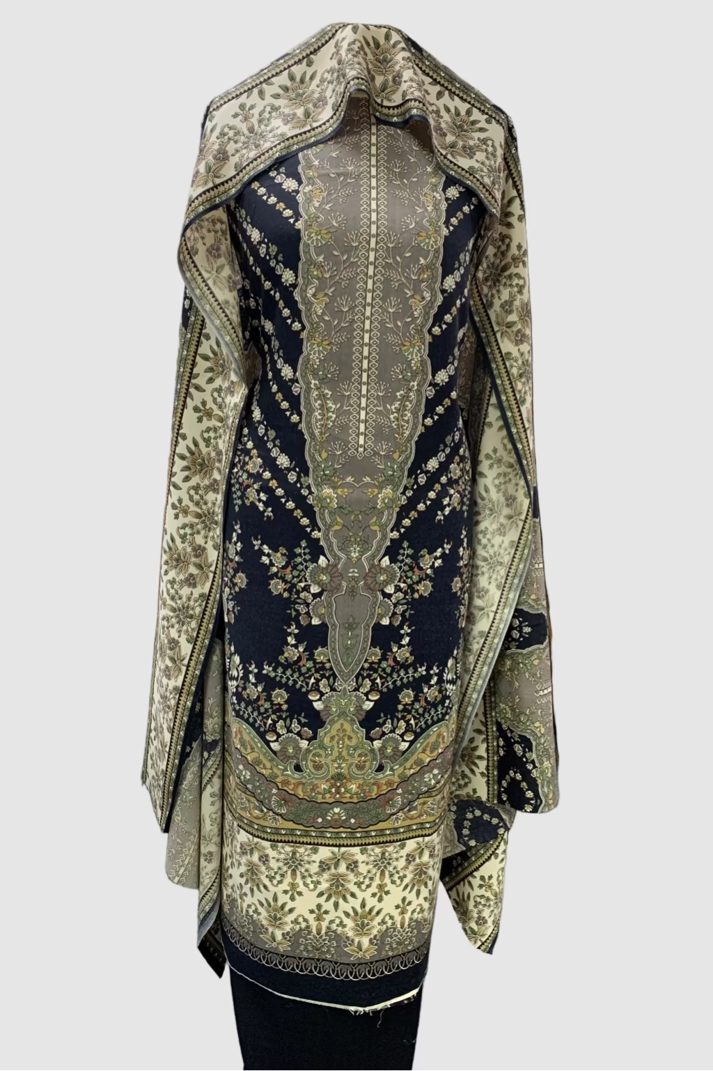 Decorative garment with intricate patterns in a fabric store setting