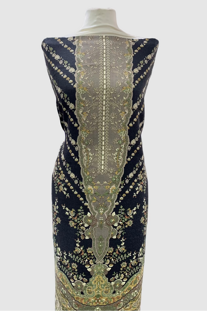 Mannequin wearing a black dress with gold floral print in a fabric store.