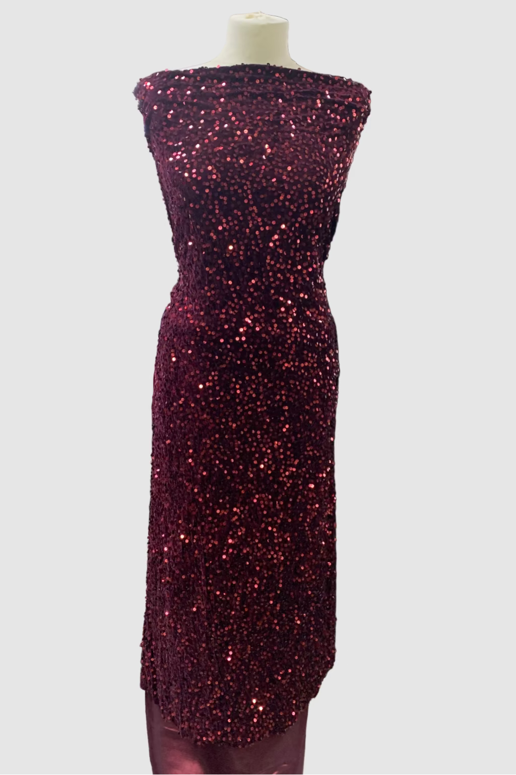 Burgundy sequin dress on a mannequin against a white background
