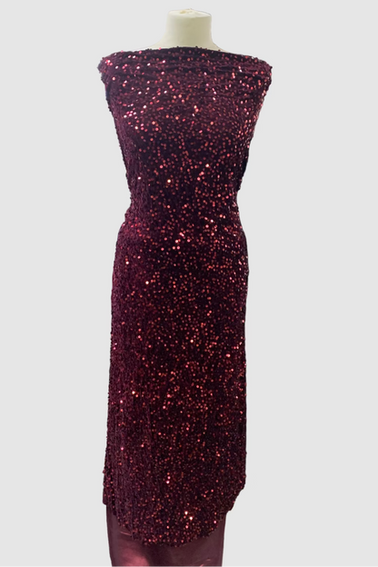 Burgundy sequin dress on a mannequin against a white background