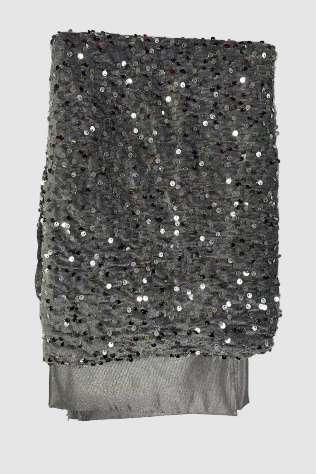 Silver sequined fabric on a white background