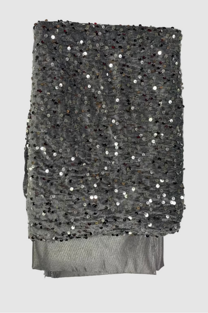 Silver sequined fabric on a white background