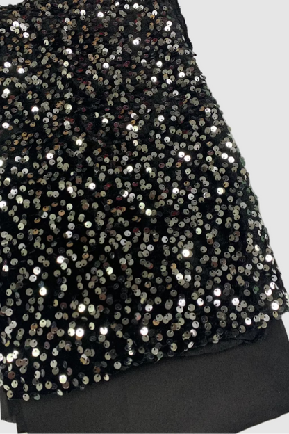 Black sequin fabric on a white background