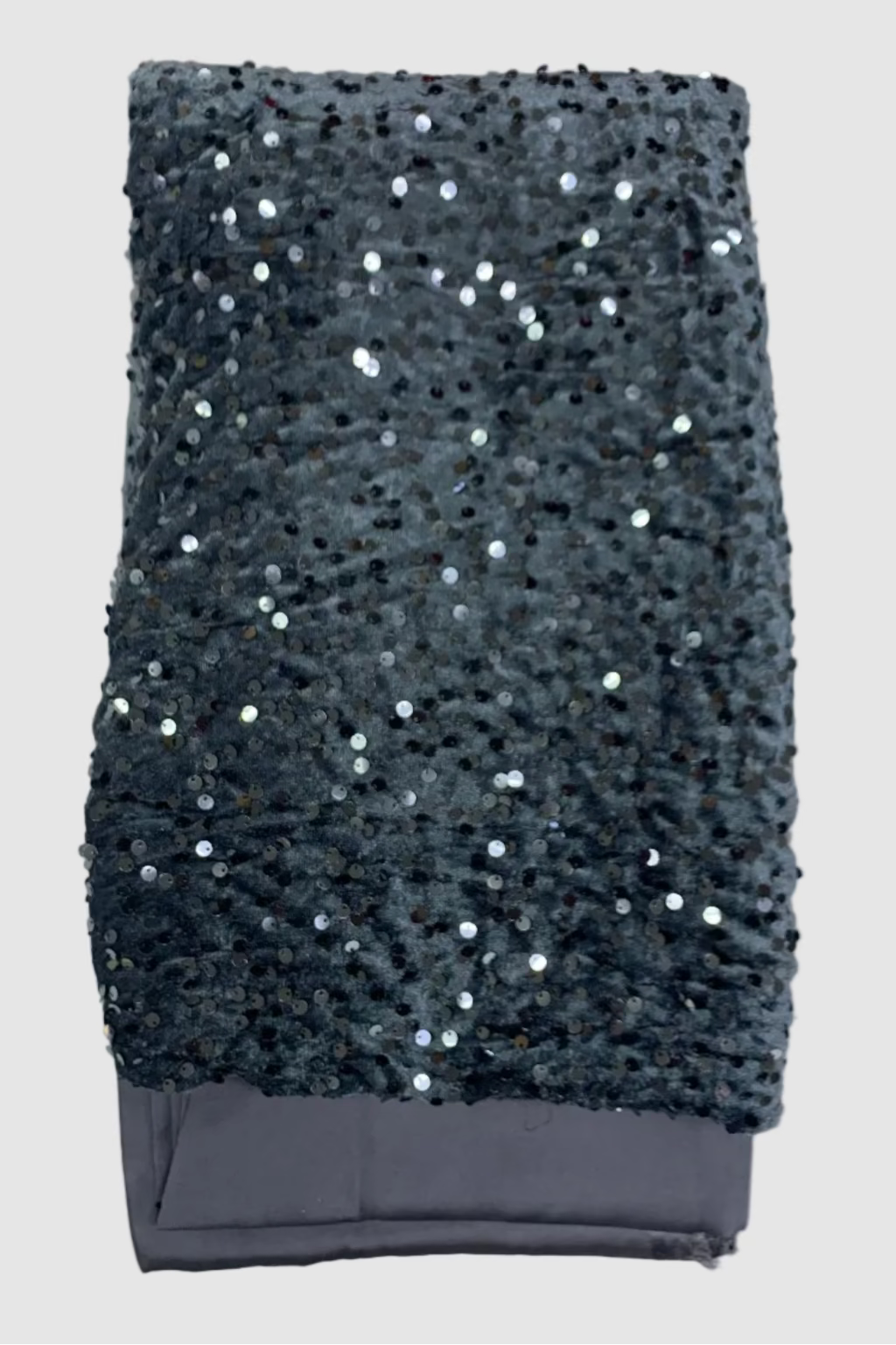 Grey sequin velvet fabric on a white background