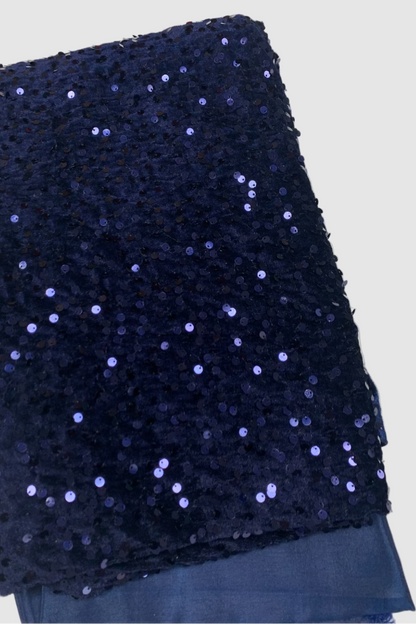 Navy blue fabric with sequins on a white background