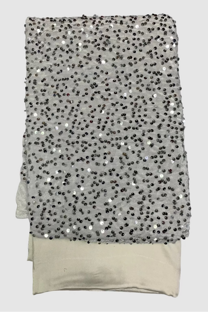 White velvet fabric with sequins on a white background