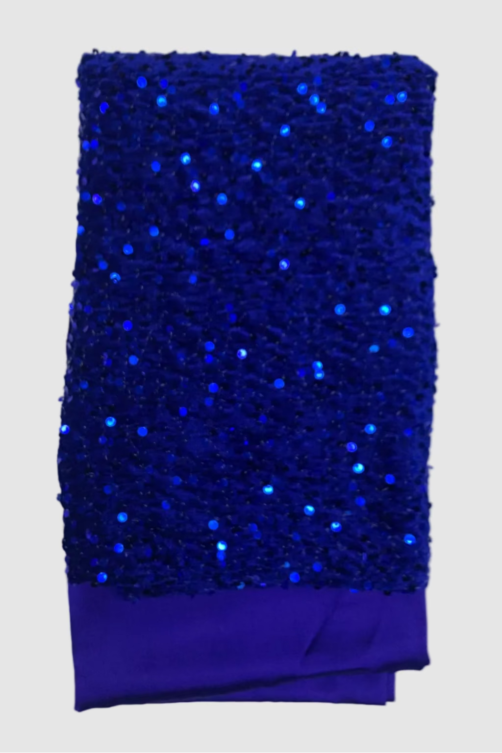 Blue velvet fabric with sequins on a white background