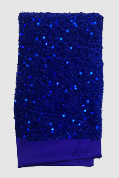 Blue velvet fabric with sequins on a white background