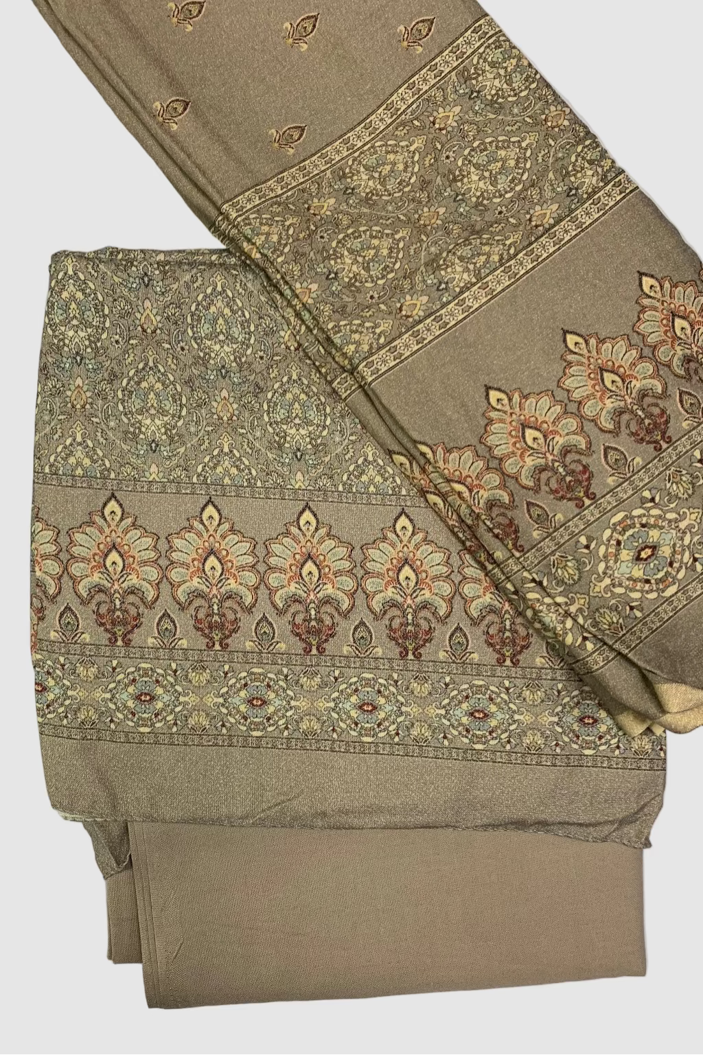 Beige printed fabric with intricate patterns on a white background