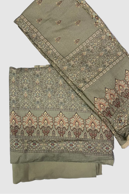 Green printed fabric on a white background