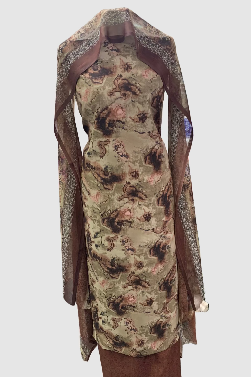 Brown floral fabric on a mannequin in a fabric store