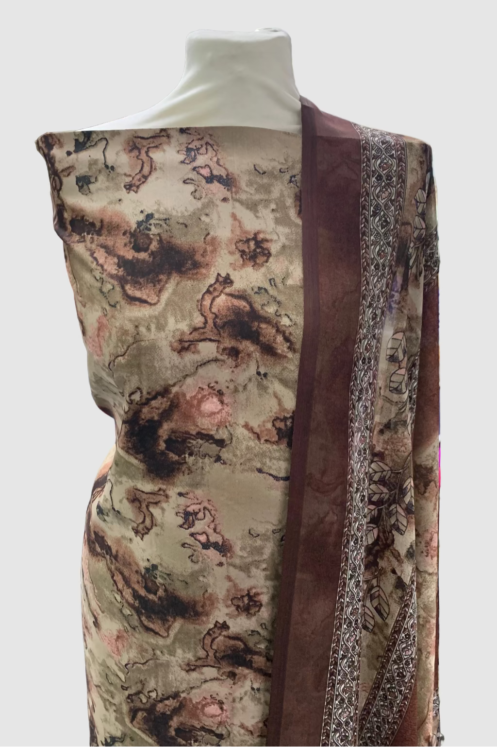 Patterned fabric on a mannequin in a store setting