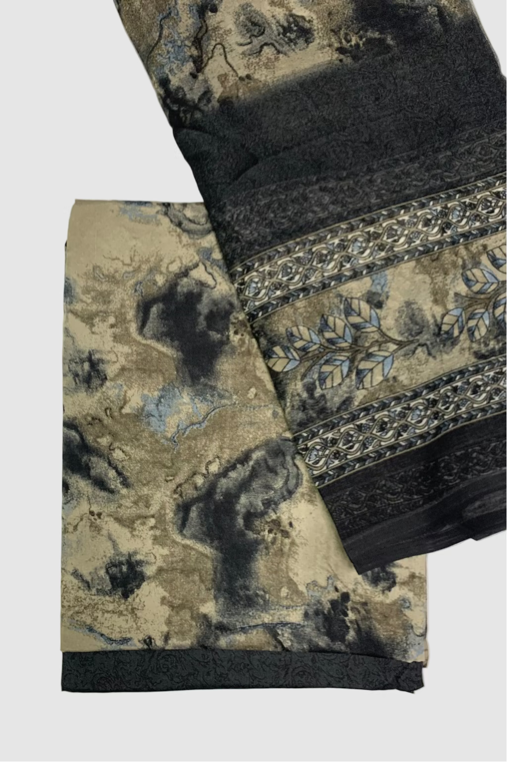 Textile with intricate patterns and textures on a light background