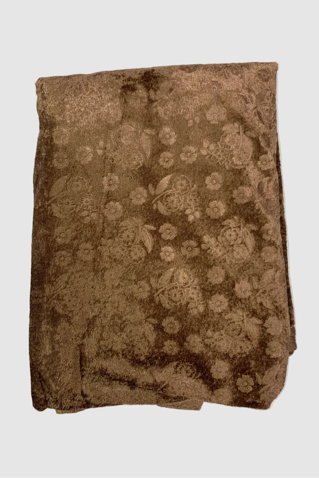 Brown fabric with floral pattern on a white background