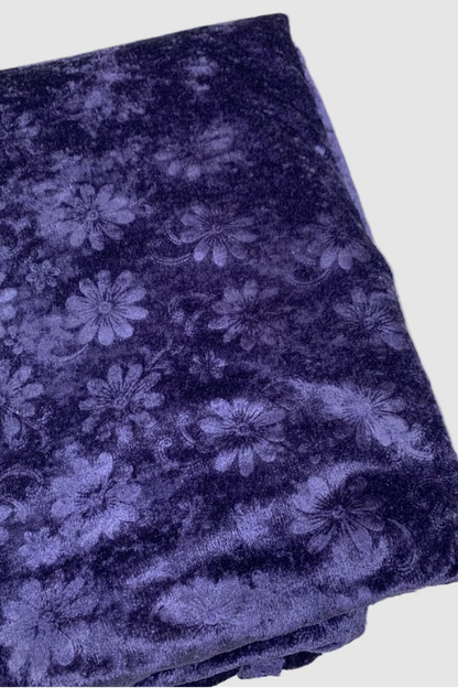 Blue floral patterned fabric on a white background