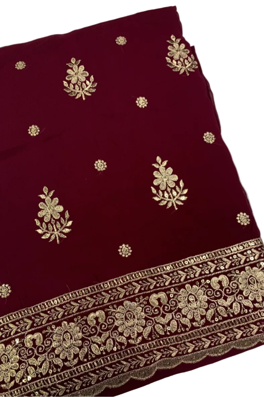 Maroon fabric with gold embroidery on a white background