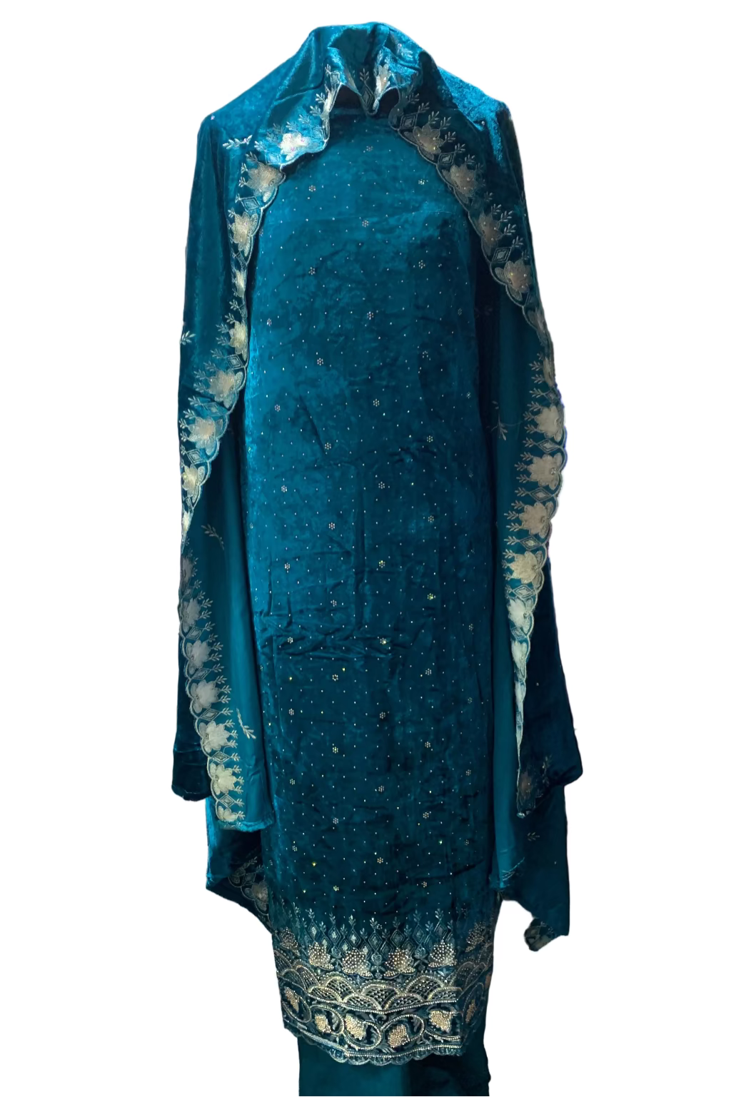 Teal embroidered dress on a mannequin in a fabric store