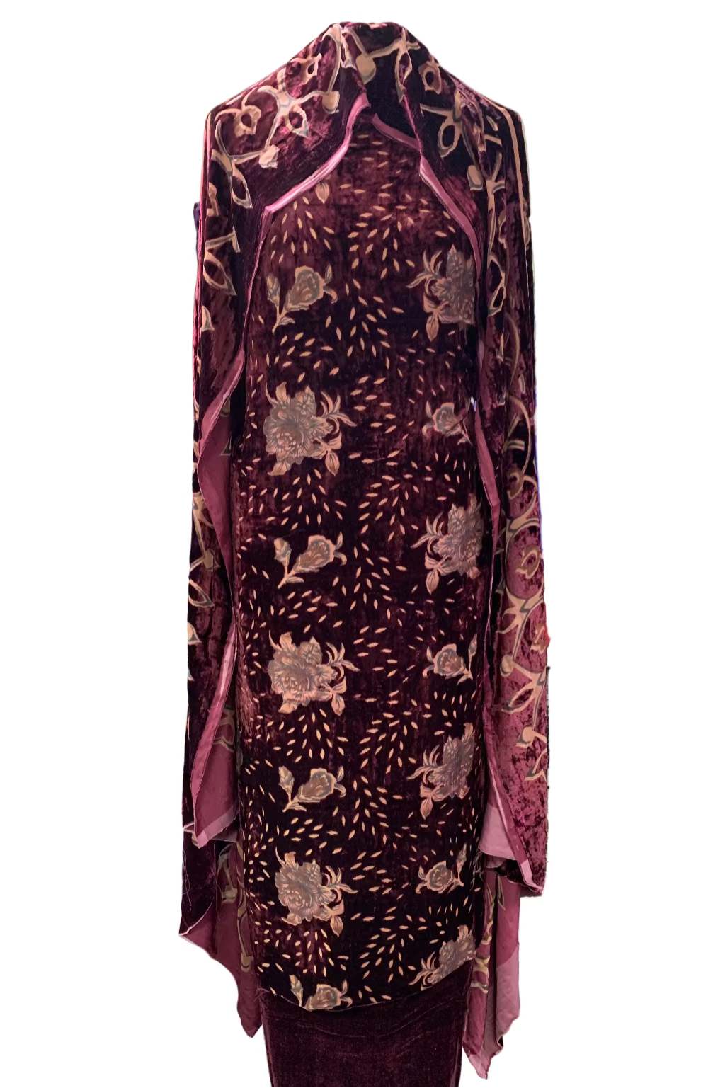 Traditional velvet garment in a store setting