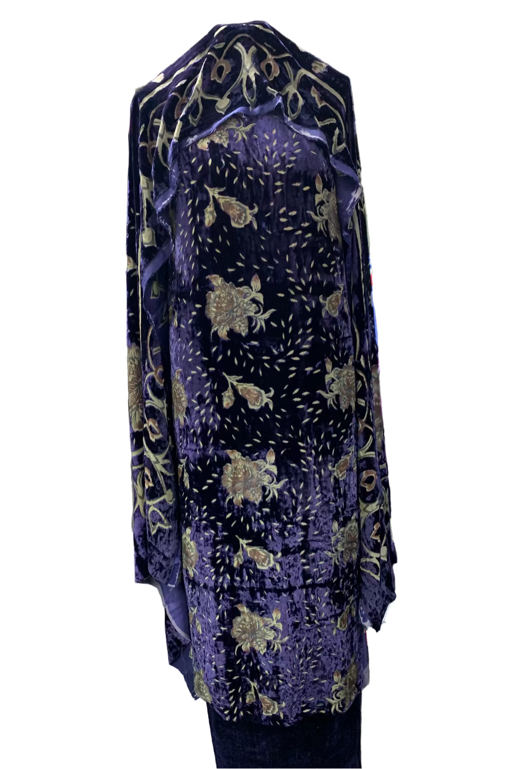 Blue velvet garment in a store setting