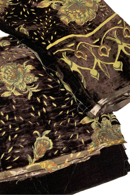 Folded fabric with floral patterns on a white background