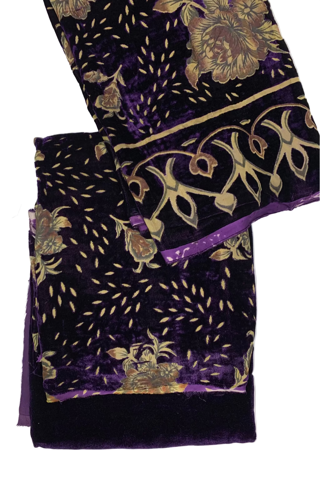 Purple fabric with gold floral and leaf patterns on a white background