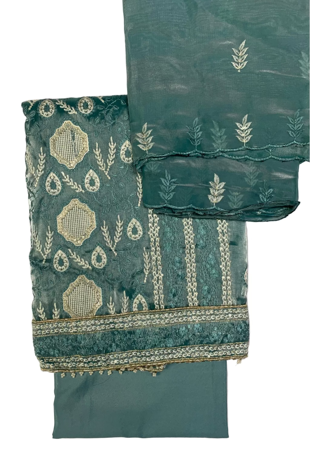 Teal fabric with intricate white patterns on a light gray background