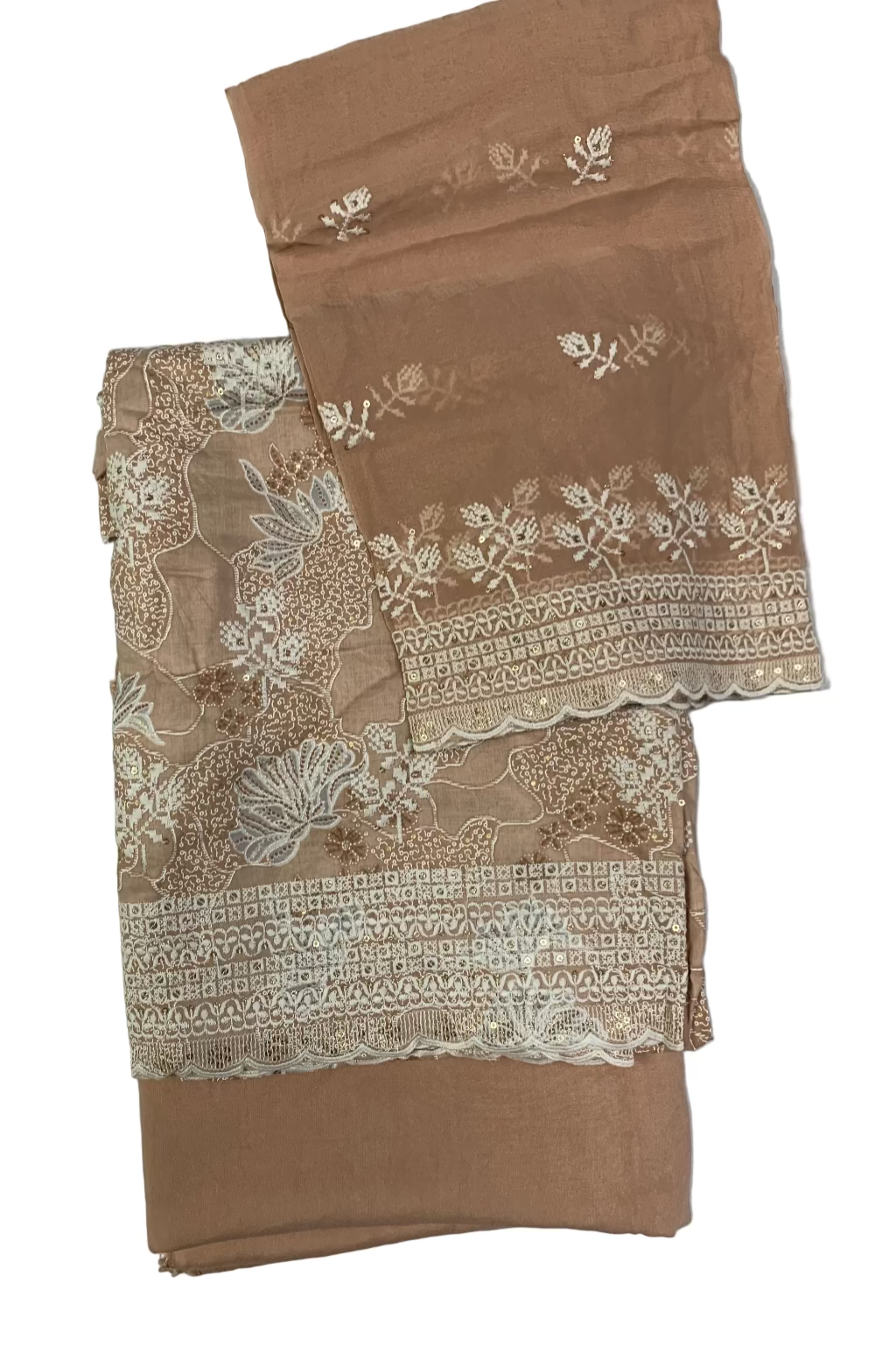 Peach fabric with intricate white lace and floral patterns on a white background