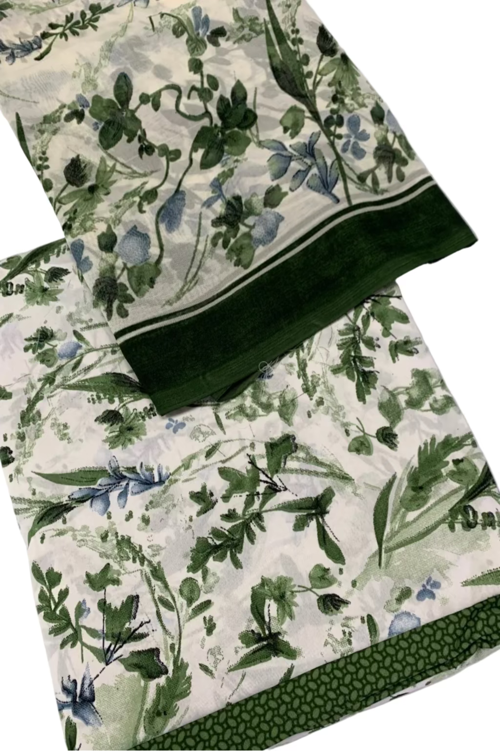 Green floral fabric on a white surface