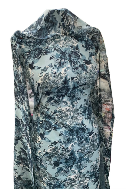 Floral patterned dress on a mannequin in a store setting